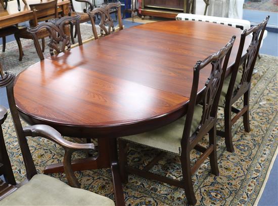 Kofod Larsen for Faarup Mobelfabrik, Denmark. A rosewood extending dining table, L 220cm (max) W 120cm